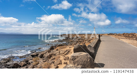 Coastal strip to the Faro de Punta Pechiguera lighthouse on Lanzarote 119147438