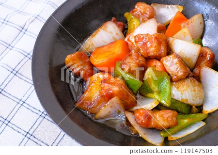 Sweet and sour pork with pork shoulder and vegetables in black vinegar Sweet and sour pork with pork shoulder and vegetables in black vinegar 119147503