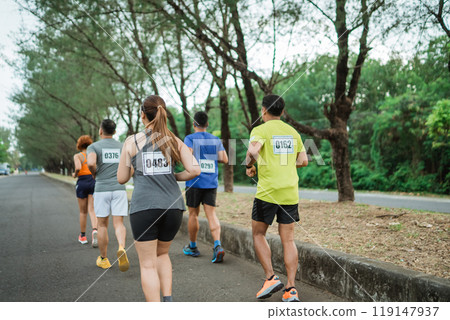back view runner participating marathon competition back view runner participating marathon competition 119147937
