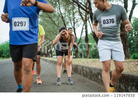 asian female runner feeling exhausted after running asian female runner feeling exhausted after running 119147938