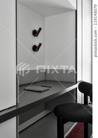 A modern minimalist workspace featuring elegant design elements that inspire creativity 119148079