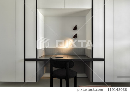 Explore the beauty of a modern minimalist workspace with elegant, stylish lighting 119148088