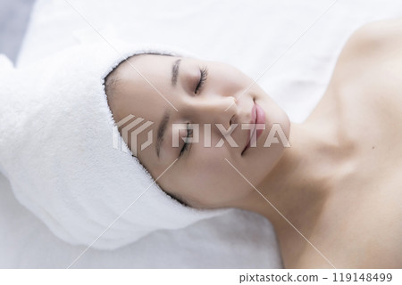 Woman taking care of her face Woman taking care of her face 119148499