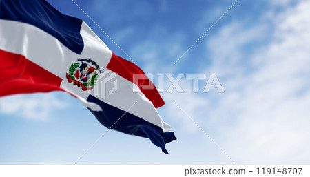 Detail of the national flag of the Dominican Republic waving in the wind on a clear day 119148707