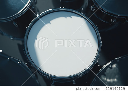 A close up of a drum set with a white drum in the center 119149129