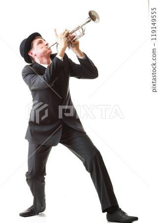 Portrait of a young man playing his Trumpet 119149555