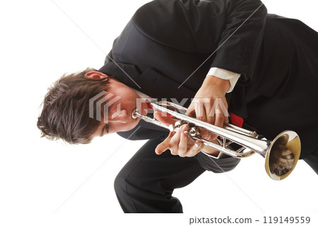 Portrait of a young man playing his Trumpet 119149559