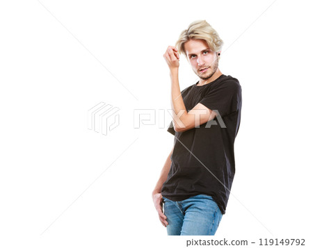 Young man posing wearing trendy outfit Young man posing wearing trendy outfit 119149792