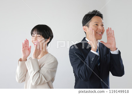 Business people male and female_talking into the distance_1 119149918