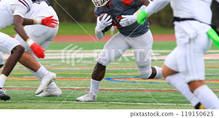 Football running back running into the whole in the defense 119150625