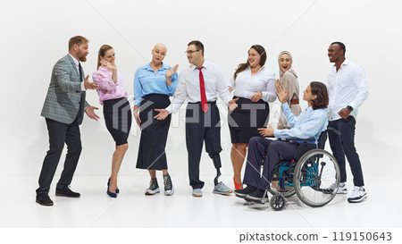 Lively group of diverse people, colleagues engage in animated conversation, with visible enthusiasm, showing inclusion and acceptance in the workplace. 119150643