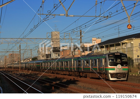 Tokaido Line E217 series train speeding along with the body of the train painted in the sunset_Photo taken on 2009/7/26 Tokaido Line E217 series train speeding along with the body of the train painted in the sunset_Photo taken on 2009/7/26 119150674
