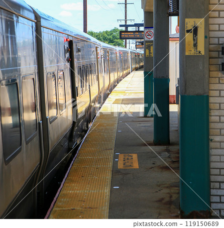 Long Island Railroad Train arriving at the Babylon train station Long Island Railroad Train arriving at the Babylon train station 119150689