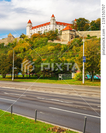 bratislava, slovakia - 16 oct 2019: castle on the hill. autumn season. popular travel destination. sunny day. downtown street 119150707