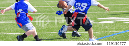 Two flag football players chasing another player who has the ball 119150777