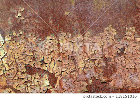 Flaking paint from the rusty metal surface 119151010