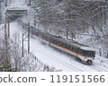 The Shinano Express train travels through snowy scenery 119151566