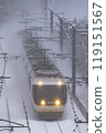 The Shinano Express train travels through snowy scenery 119151567