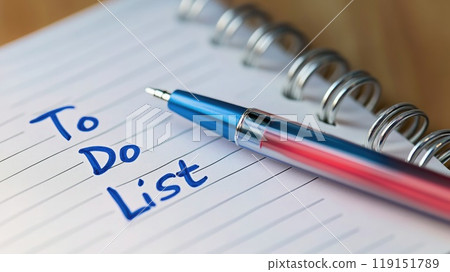 A pen is on top of a to do list 119151789