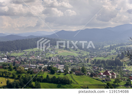 Scenic landscape view of Vorokhta, picturesque mountain village with green hills and forests 119154086