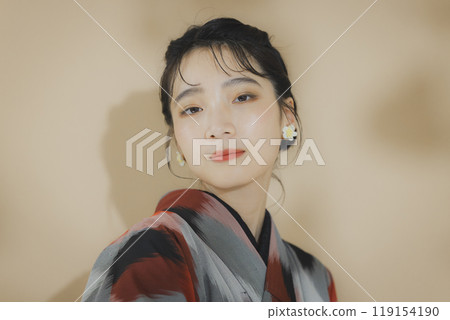 A woman in a kimono Meisen with a geometric pattern A woman in a kimono Meisen with a geometric pattern 119154190