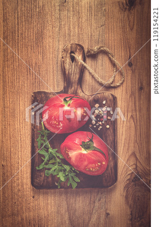 sliced tomato, on a wooden chopping board, food background, no people, sliced tomato, on a wooden chopping board, food background, no people, 119154221