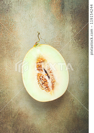 fresh melon in section, half melon, chardzhuiskaya variety, gulabi melon, top view, fresh melon in section, half melon, chardzhuiskaya variety, gulabi melon, top view, 119154244