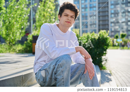Outdoor, portrait smiling handsome young male 19-20 years old 119154813