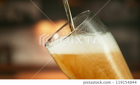 Close-up of Pouring Beer Drink, Super Macro shot. Close-up of Pouring Beer Drink, Super Macro shot. 119154844