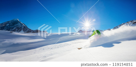 Man skier running downhill on sunny alpine slope Man skier running downhill on sunny alpine slope 119154851