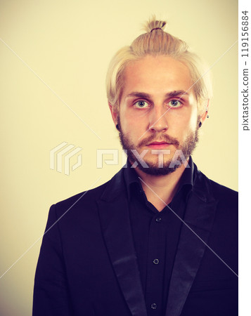 Attractive blonde man in bun 119156884