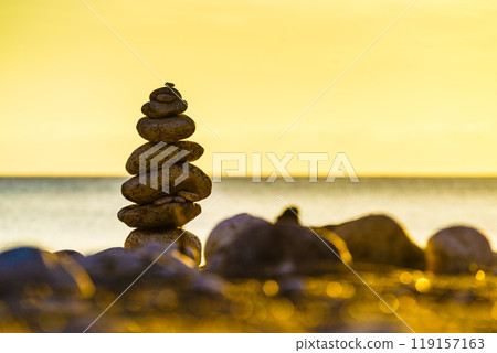 Stone stack on beach sea shore. Stone stack on beach sea shore. 119157163