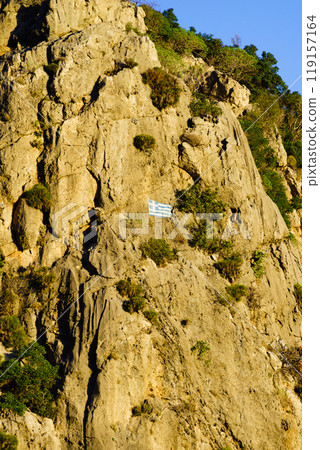 Greek flag in Taygetus mountains Greek flag in Taygetus mountains 119157164