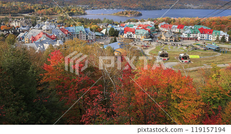 Lake and Mont Tremblant resort in autumn with cable car on the foreground, Canada 119157194