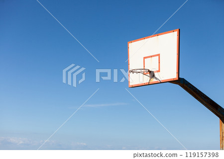 basketball basket against blue sky 119157398