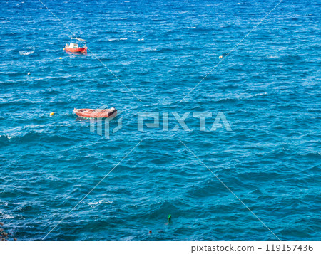 Small boat on sea water Small boat on sea water 119157436