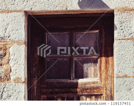 Old wooden door with window Old wooden door with window 119157451