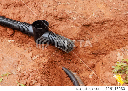 Laying of drainage pipes for stormwater of underground in open trench 119157680