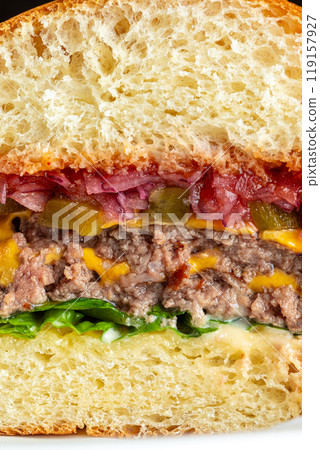 Closeup on cheeseburger layers slice 119157927