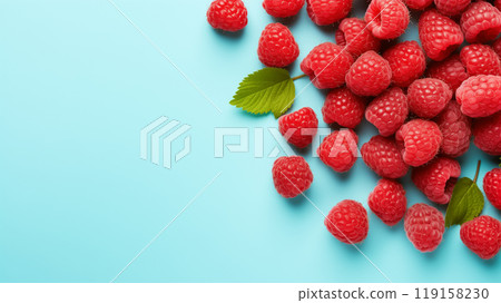 ripe raspberry fruit on a blue background 119158230
