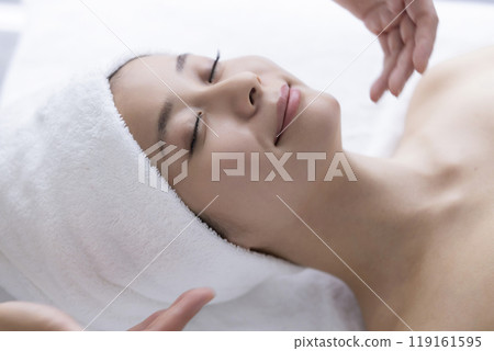 Woman receiving body care Woman receiving body care 119161595