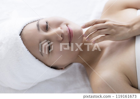 Woman taking care of her face 119161673