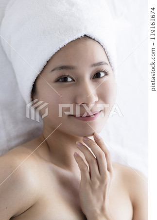 Woman taking care of her face 119161674