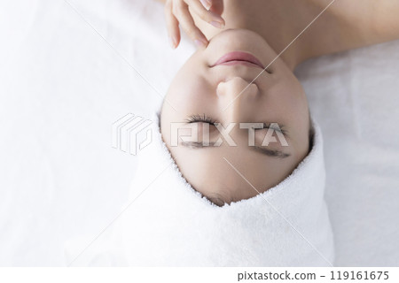 Woman taking care of her face 119161675