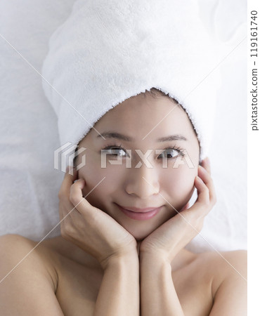 Woman taking care of her face 119161740