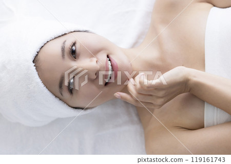 Woman taking care of her face 119161743
