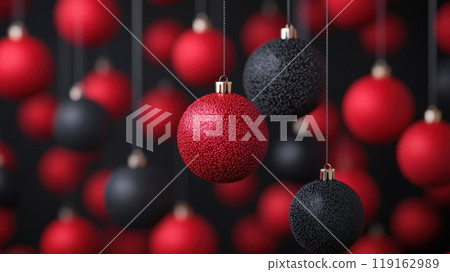 A bunch of red and black Christmas ornaments hanging from the ceiling 119162989