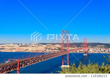 The 25th April Bridge (Ponte 25 de Abril) is a suspension bridge road-rail over the Tagus river that connects the city of Lisbon to the city of Almada. View from Almada The 25th April Bridge (Ponte 25 de Abril) is a suspension bridge road-rail over the Tagus river that connects the city of Lisbon to the city of Almada. View from Almada 119166215