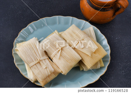 Mexican cuisine tamales and atole 119166528