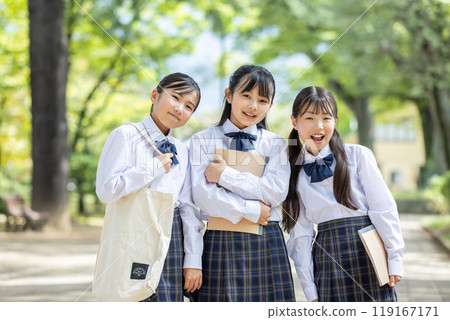 Smiling female student in uniform Smiling female student in uniform 119167171